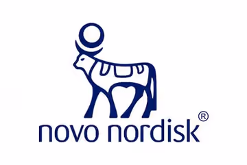 一头风格化的公牛蓝色线条画，头顶有圆圈，图像下方写着“novo nordisk”。
